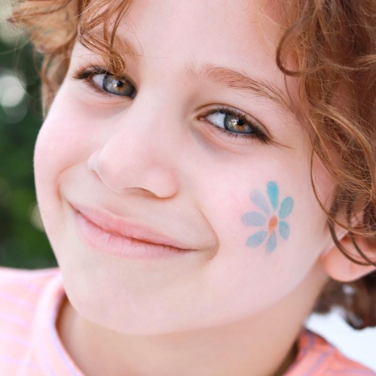 Kaveri Mehta, Lead Design Curator at SunsetMosaicPilot, reviewing corporate floral arrangements